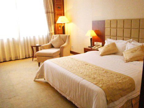 Ocean International Hotel Zhanjiang Quarto foto